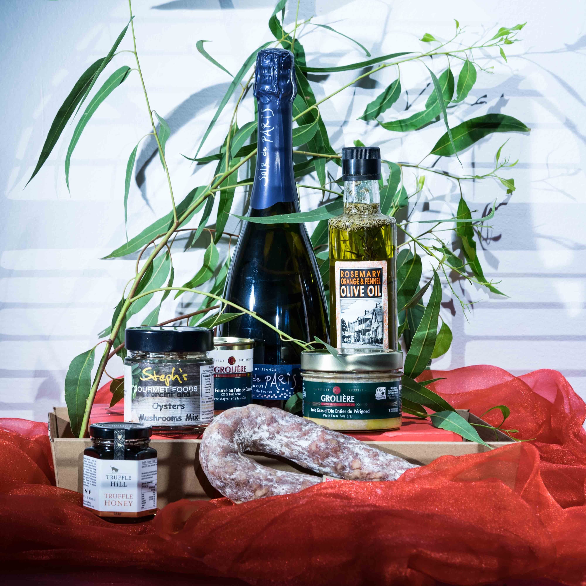 1X Stuffed Duck Breast with Foie Gras  190g  1X Goose Foie Gras  180g  1X Porcini Oysters Mushrooms  ( Approx 15g )  1X Saucisson Sec  ( Approx 500g )  1X Extra Bottle of Olive Oil Wollombi  500ml  1X Bottle of Sparkling   750ml  1xTruffle Honey    135g     